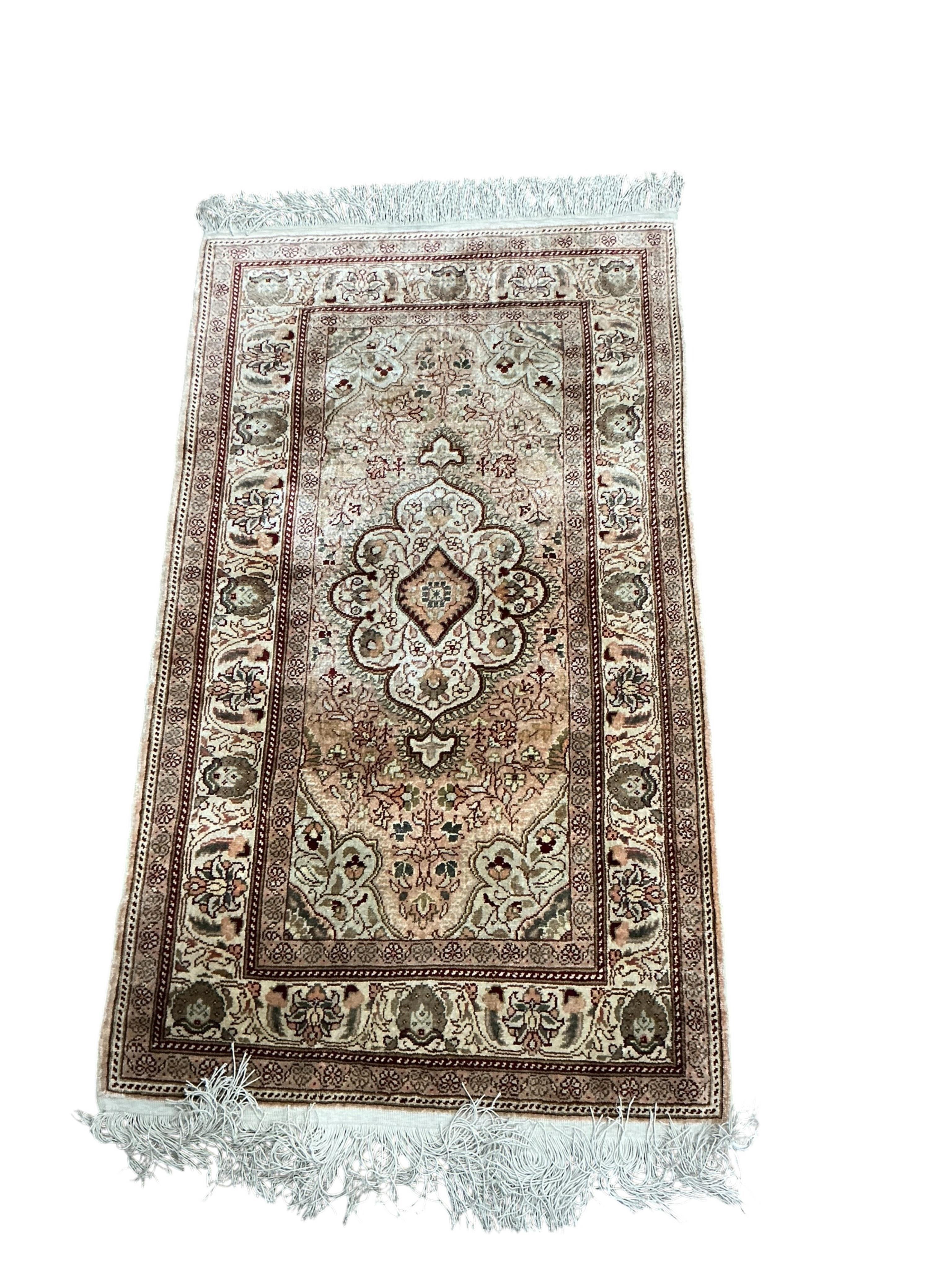 Two North West Persian prayer mats, larger 108 x 64cm